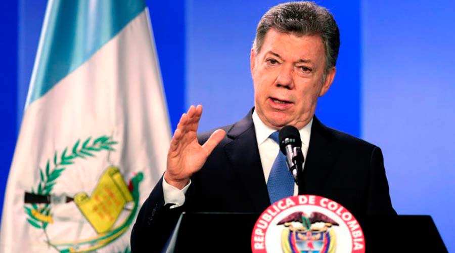 Juan Manuel Santos acusa a Maduro de pagar a colombianos para que voten en Venezuela