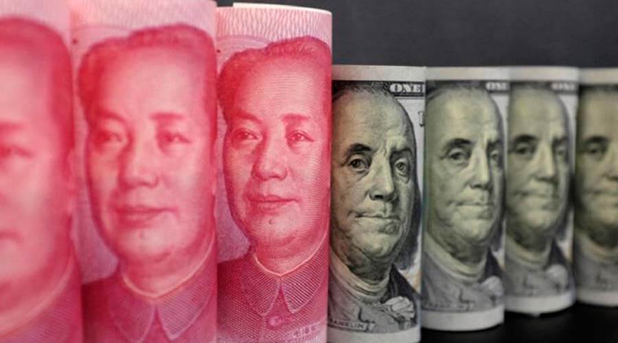 Bancos de China compran y venden dólares para respaldar al yuan